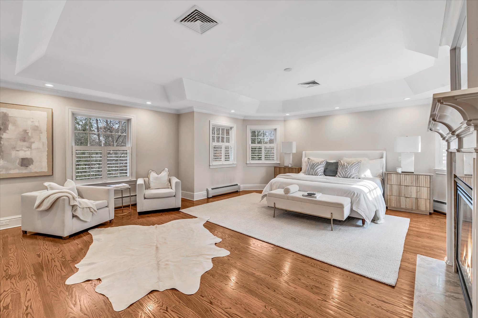 139 Jelliff Mill Road New Canaan, CT 06840 - Photo 24 of 40 a bedroom with furniture and a couch