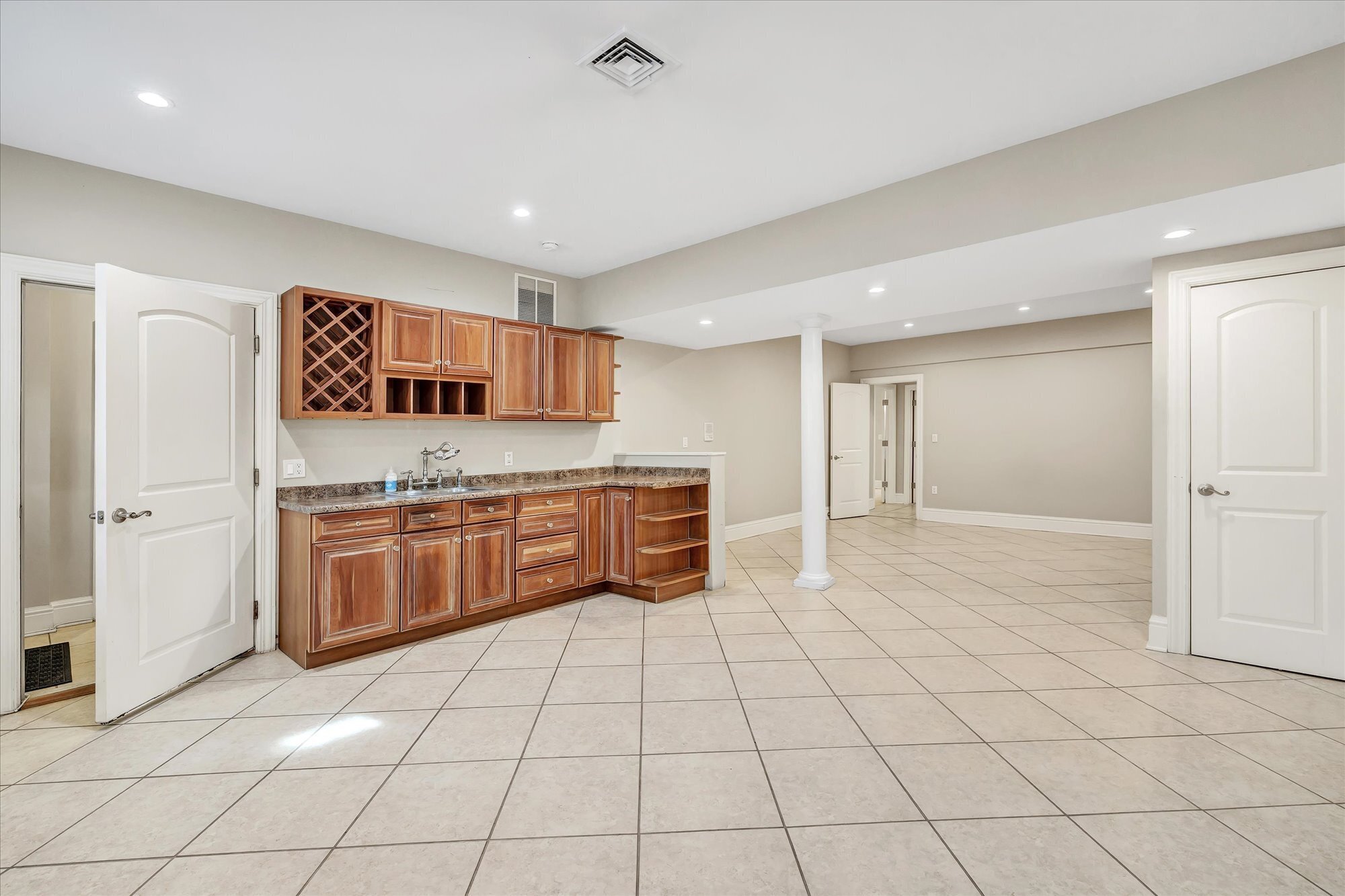 139 Jelliff Mill Road New Canaan, CT 06840 - Photo 34 of 40 a open kitchen with stainless steel appliances a stove a sink and a refrigerator