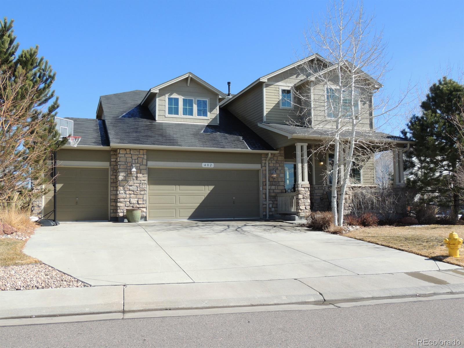 a front view of a house with yard
