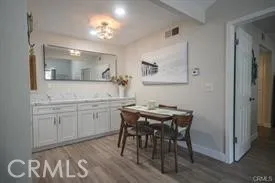 a kitchen with a table and chairs in it