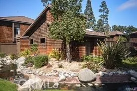 a house with trees in front of it