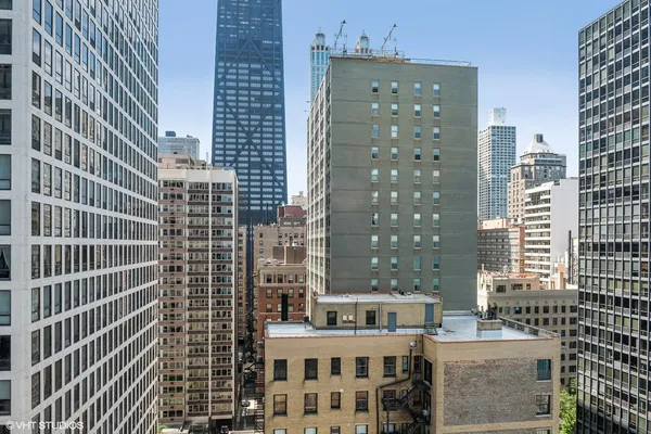 a view of a city with tall buildings