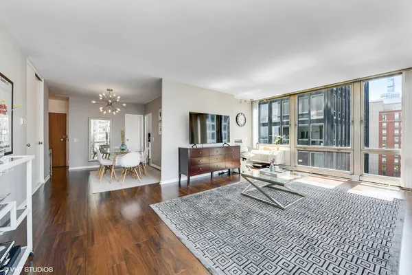 a living room with furniture and a table