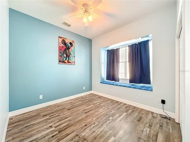 a view of entryway with wooden floor