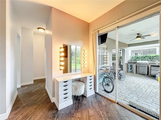 a view of a workspace with furniture and a workspace