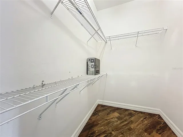 a kitchen with a stove a sink and a refrigerator