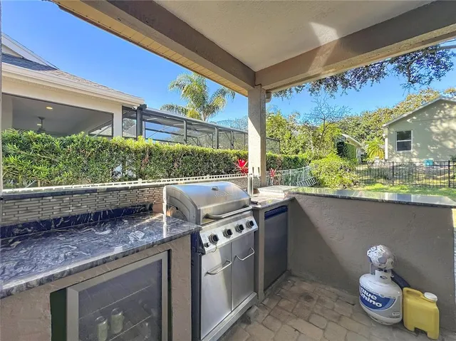 a view of swimming pool with seating space