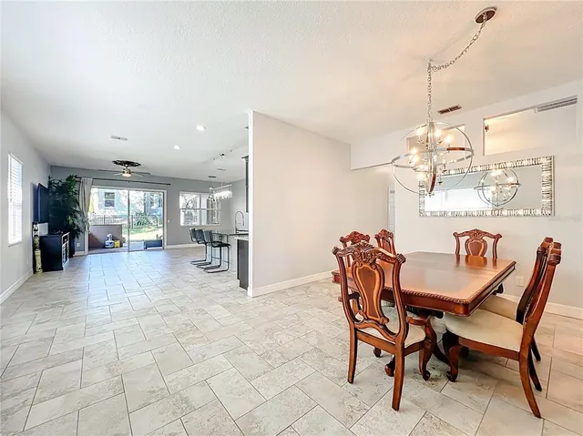 a bedroom with a bed and a flat tv screen