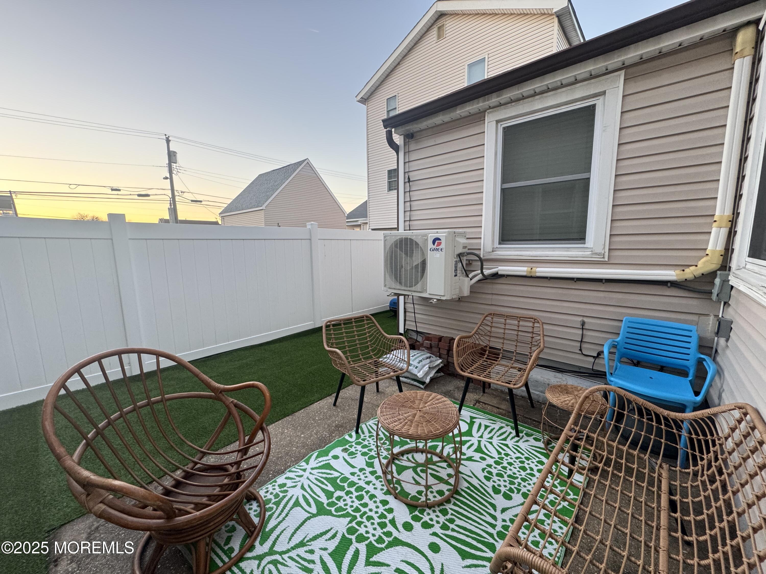 124 Lincoln Avenue, Unit 4 Seaside Heights, NJ 08751 - Photo 12 of 14 a front view of a house with outdoor seating