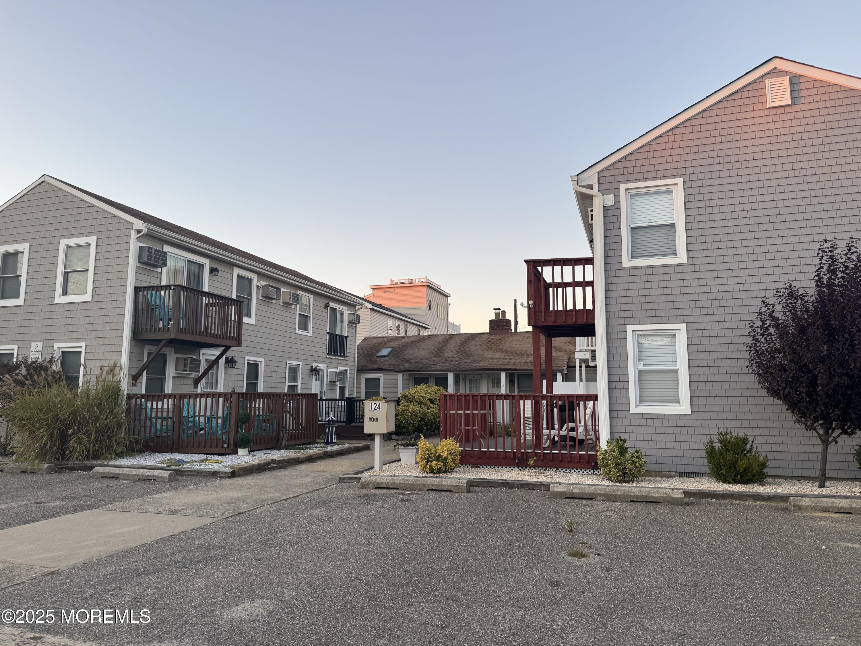 124 Lincoln Avenue, Unit 4 Seaside Heights, NJ 08751 - Photo 3 of 14 a view of a building with a street