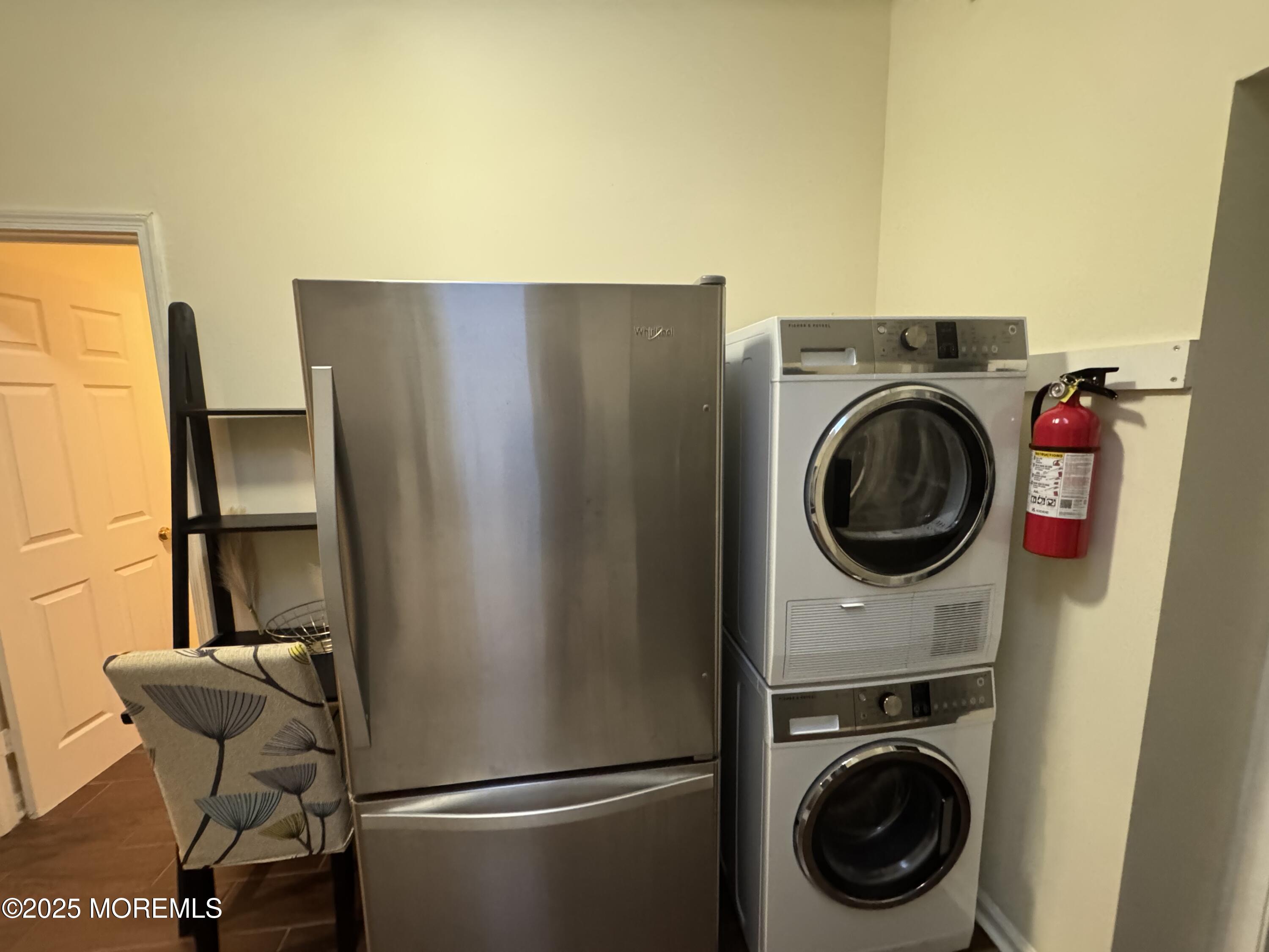 124 Lincoln Avenue, Unit 4 Seaside Heights, NJ 08751 - Photo 4 of 14 a view of a storage & utility room with washer and dryer