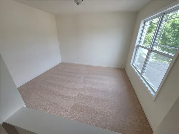 an empty room with an entryway