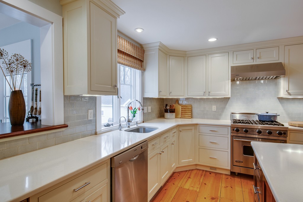 42 Oak Hill Road Harvard, MA 01451 - Photo 12 of 30 a kitchen with a sink a stove and cabinets