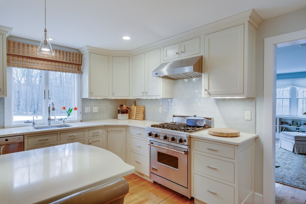 42 Oak Hill Road Harvard, MA 01451 - Photo 13 of 30 a kitchen with stainless steel appliances granite countertop a stove and a sink