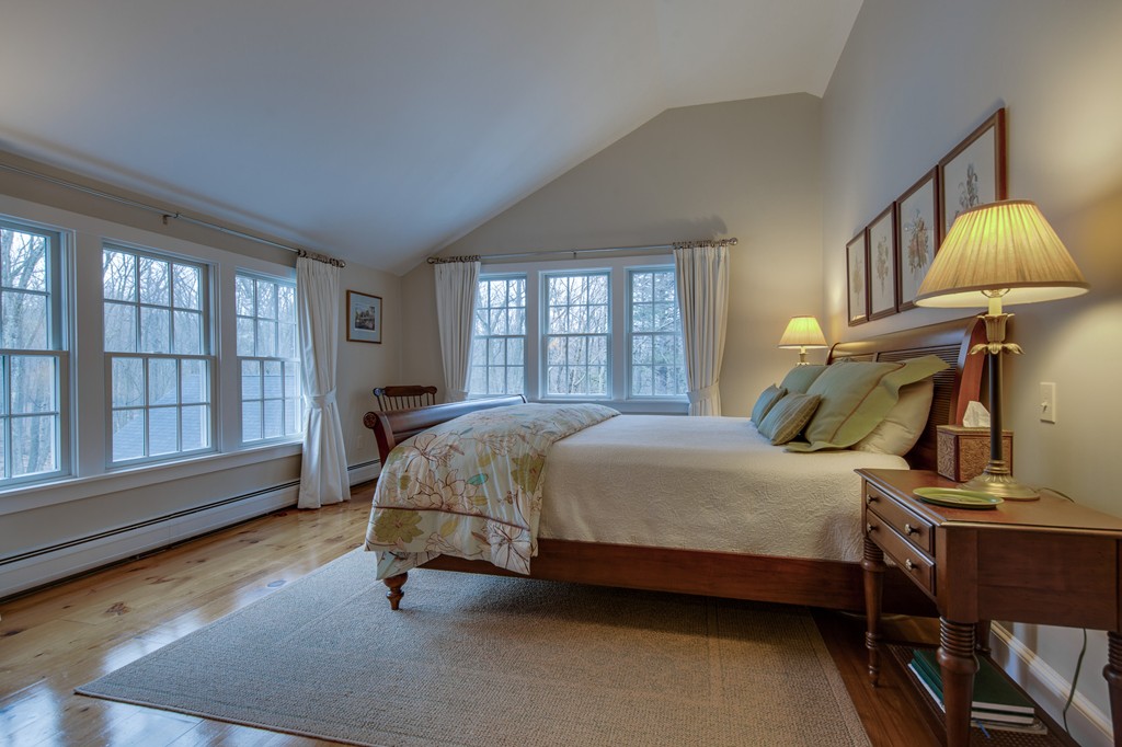 42 Oak Hill Road Harvard, MA 01451 - Photo 26 of 30 a bedroom with a bed table and window