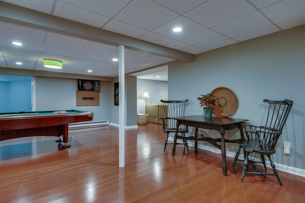 42 Oak Hill Road Harvard, MA 01451 - Photo 28 of 30 a room with furniture and wooden floor
