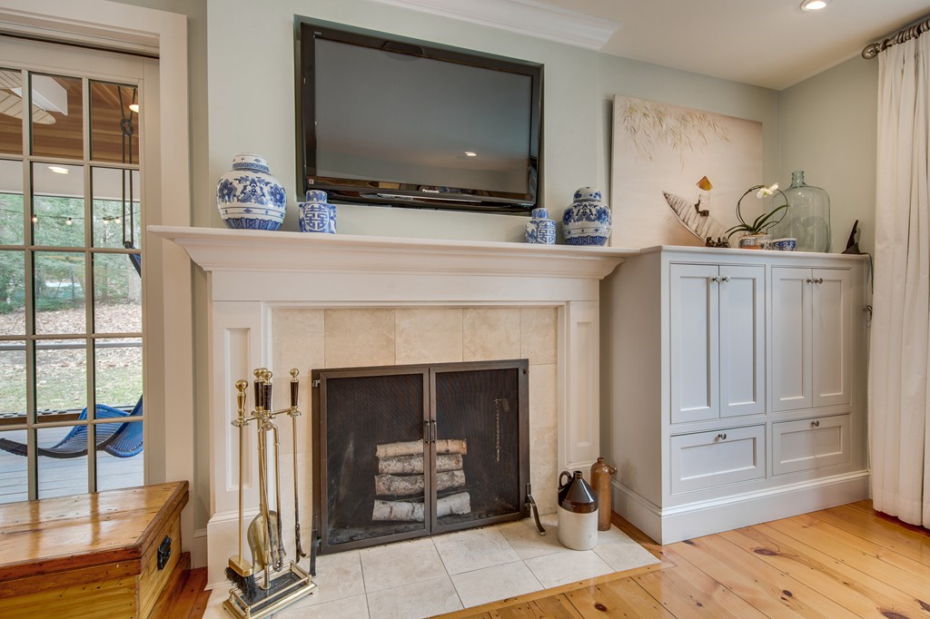 42 Oak Hill Road Harvard, MA 01451 - Photo 8 of 30 a living room with furniture and a fireplace