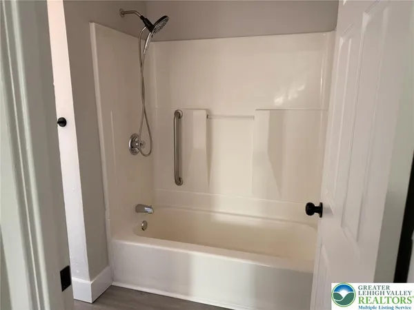 a bathroom with a bathtub
