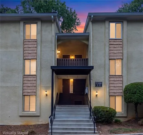 a view of a house with a porch