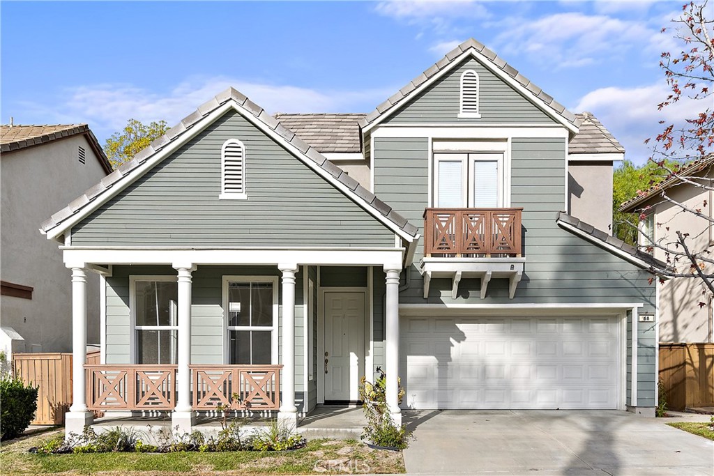 68 Kyle Court Ladera Ranch, CA 92694 - Photo 1 of 25 a front view of a house with a yard