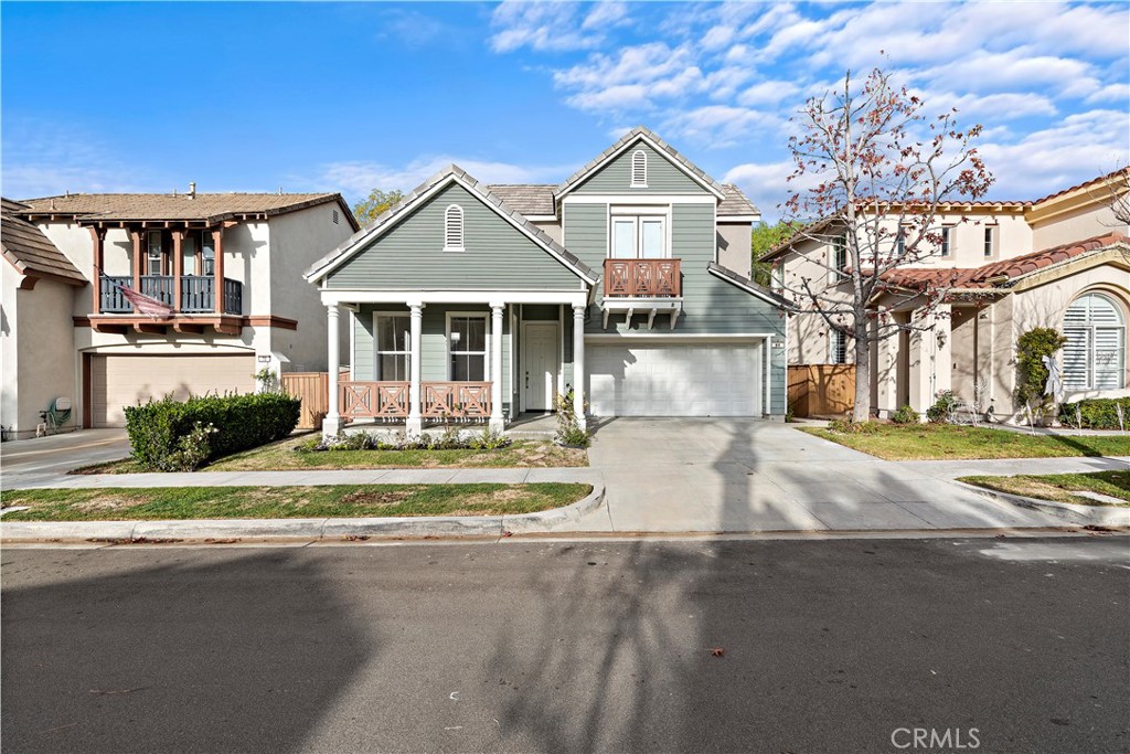 68 Kyle Court Ladera Ranch, CA 92694 - Photo 17 of 25 a front view of a house with a yard
