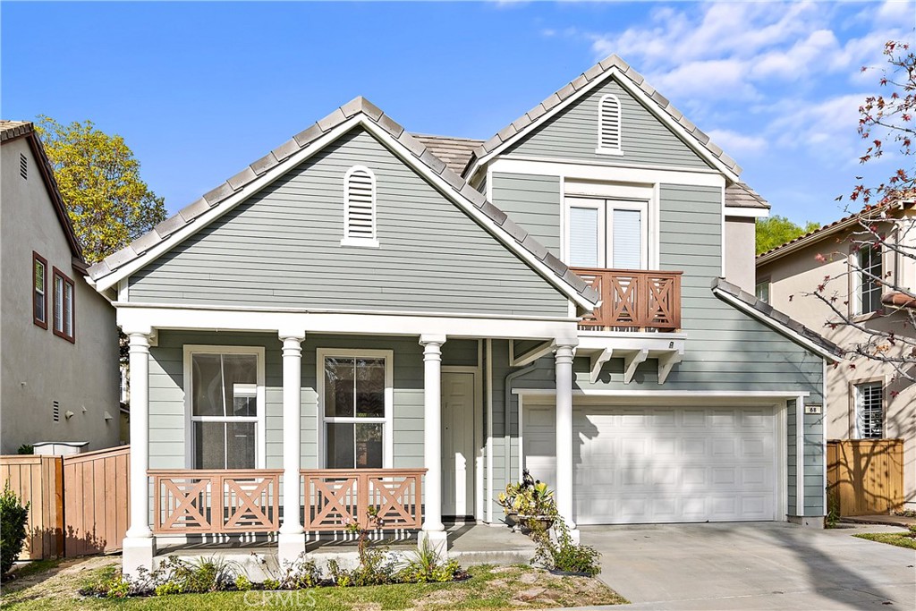 68 Kyle Court Ladera Ranch, CA 92694 - Photo 21 of 25 a front view of a house with garden