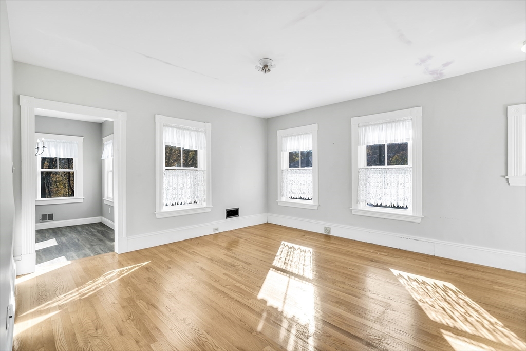 16 County Street Foxboro, MA 02035 - Photo 11 of 33 a view of an empty room with window