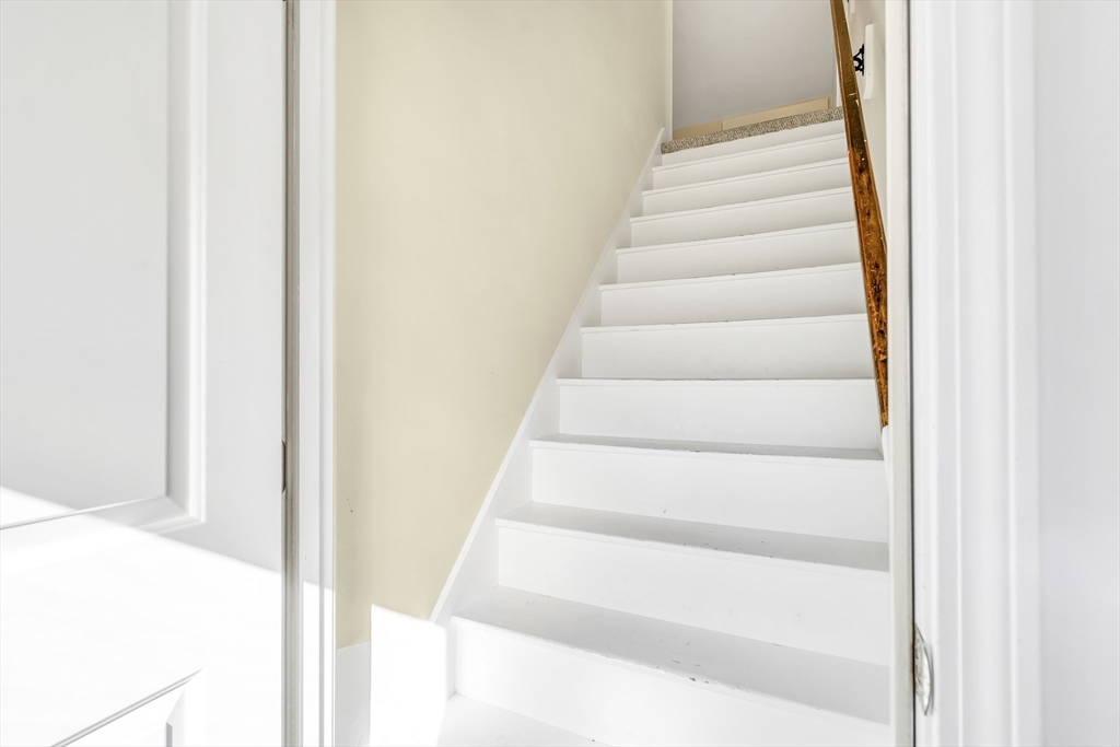 16 County Street Foxboro, MA 02035 - Photo 19 of 33 a view of staircase with white walls