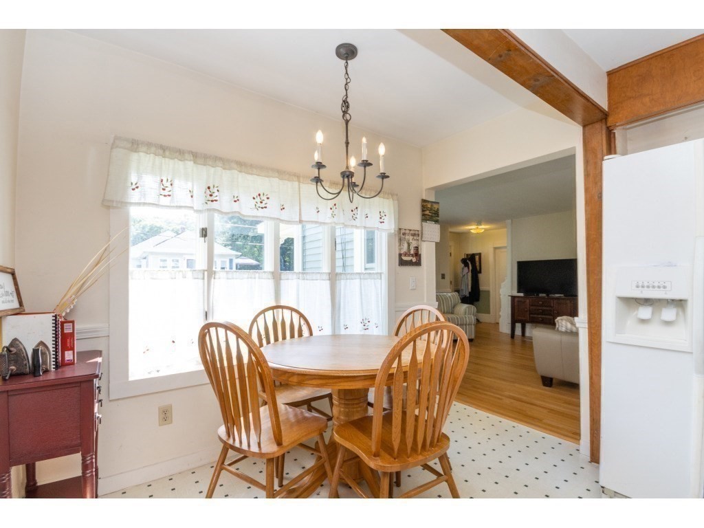 16 County Street Foxboro, MA 02035 - Photo 26 of 33 a dining room with furniture a chandelier and window