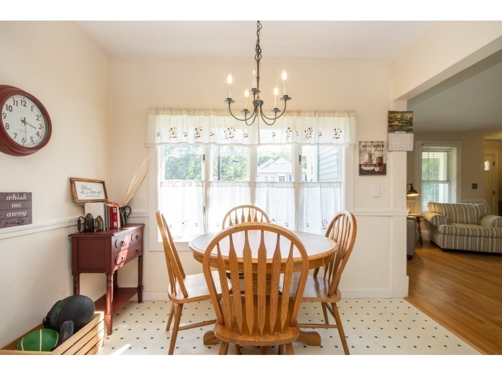 16 County Street Foxboro, MA 02035 - Photo 27 of 33 a view of a dining room with furniture and chandelier