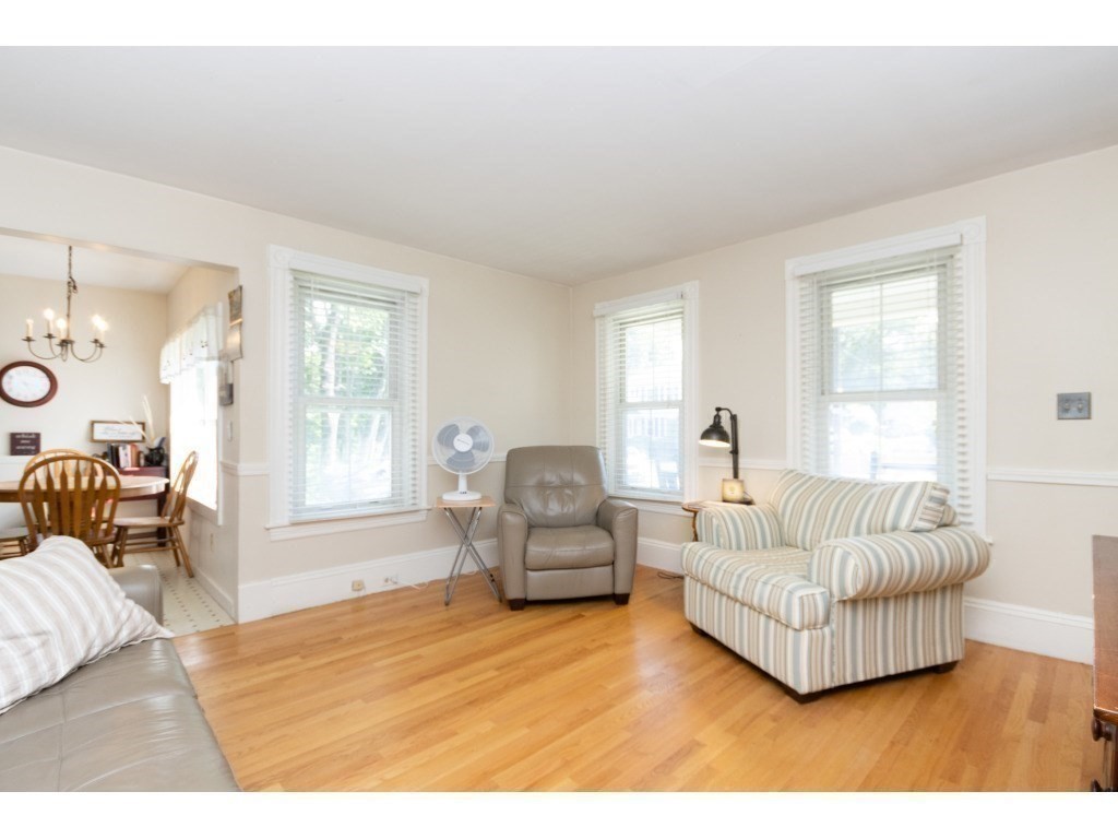 16 County Street Foxboro, MA 02035 - Photo 28 of 33 a bedroom with furniture and a large window