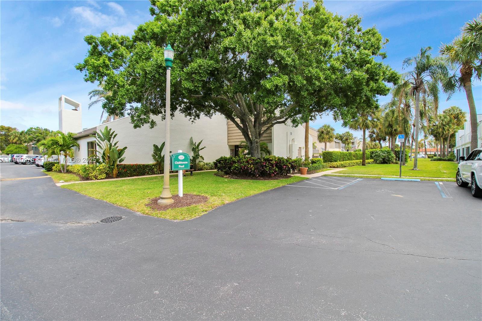 1605 Highway 1, Unit M1405 Jupiter, FL 33477 - Photo 19 of 22 a view of a playground with a slide
