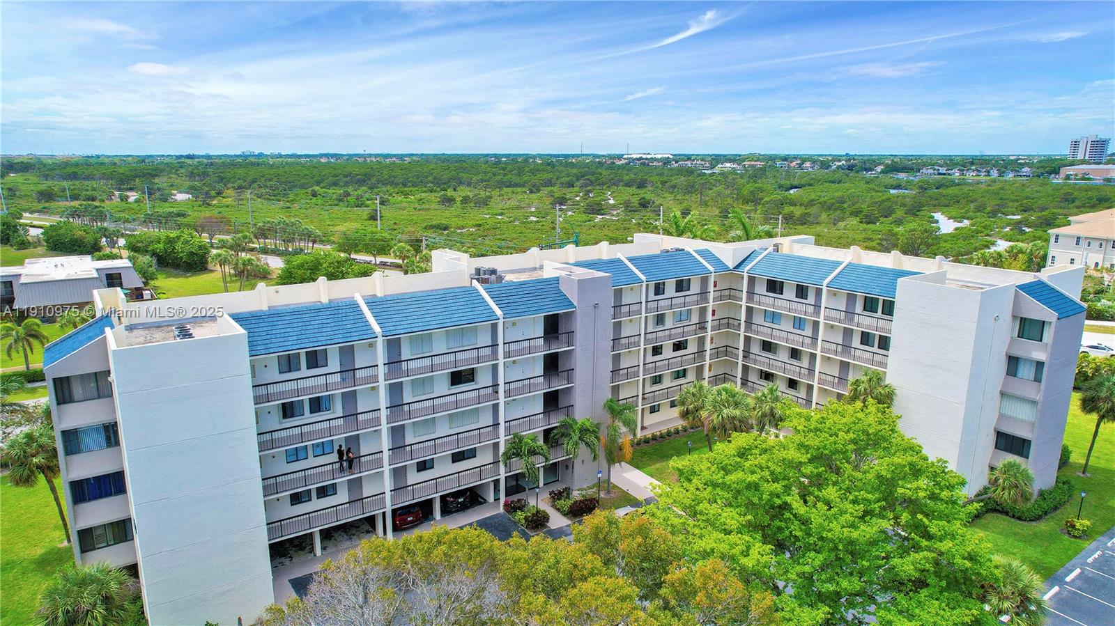 1605 Highway 1, Unit M1405 Jupiter, FL 33477 - Photo 2 of 22 a view of a city with tall buildings