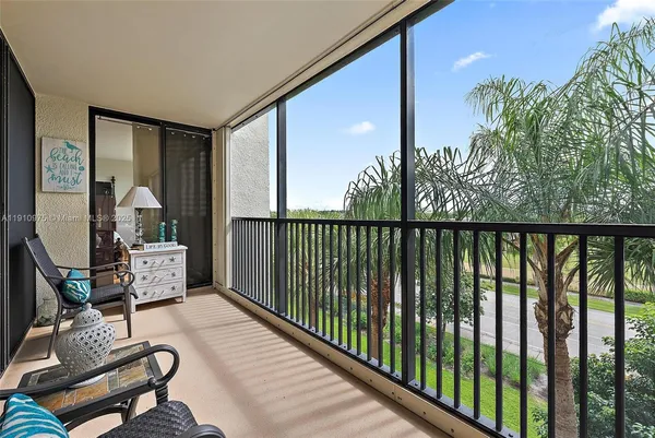 a balcony with chairs