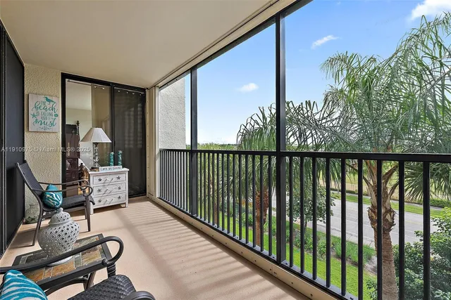 a balcony with chairs