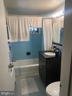 1200 South Arlington Ridge Road, Unit 415 Arlington, VA 22202 - Photo 6 of 16 a bathroom with a sink a toilet and a bathtub