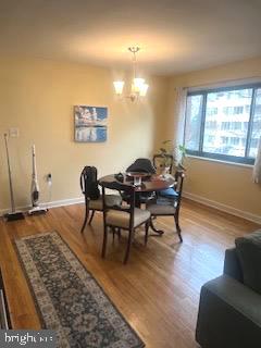 1200 South Arlington Ridge Road, Unit 415 Arlington, VA 22202 - Photo 9 of 16 a living room with furniture and a rug