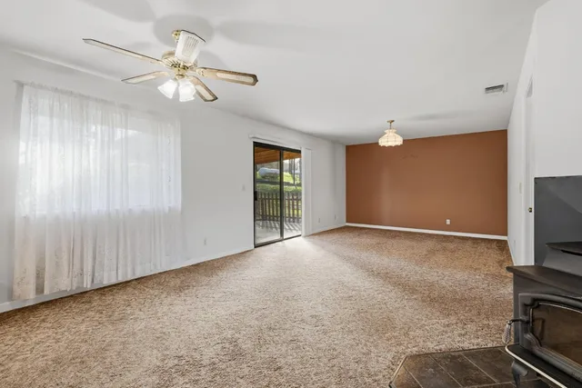 a view of a livingroom with a flat screen tv