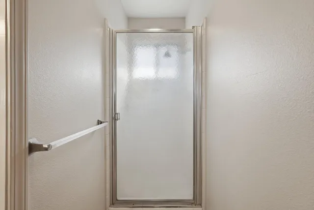 a view of house with a yard