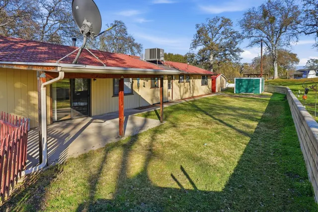 a view of a backyard with a garden