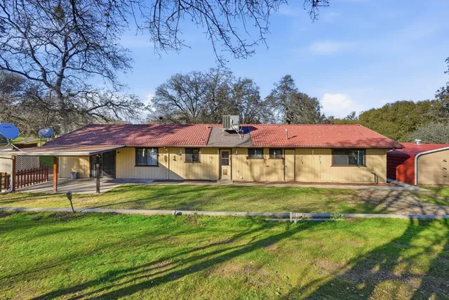a view of swimming pool with a yard