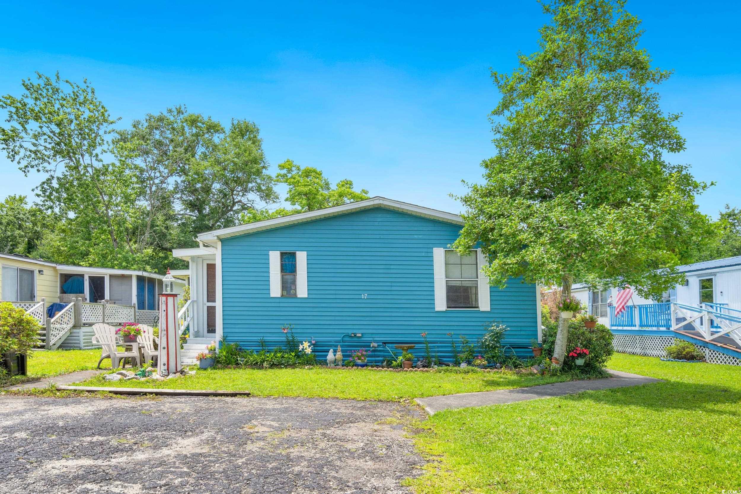 17 Crooked Island Circle Murrells Inlet, SC 29576 - Photo 1 of 39 View of front facade with a front lawn