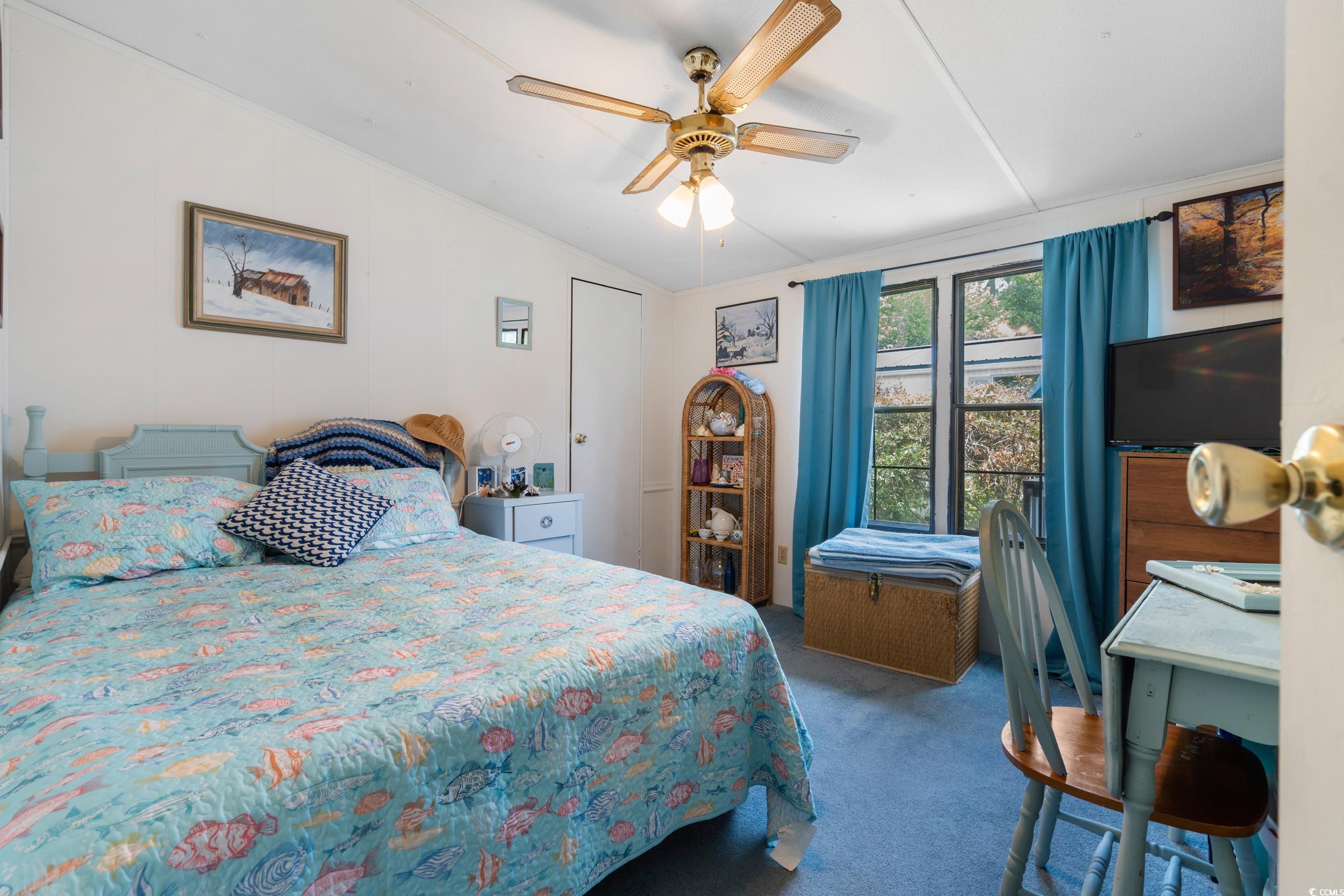 17 Crooked Island Circle Murrells Inlet, SC 29576 - Photo 23 of 39 Carpeted bedroom featuring vaulted ceiling and ceiling fan
