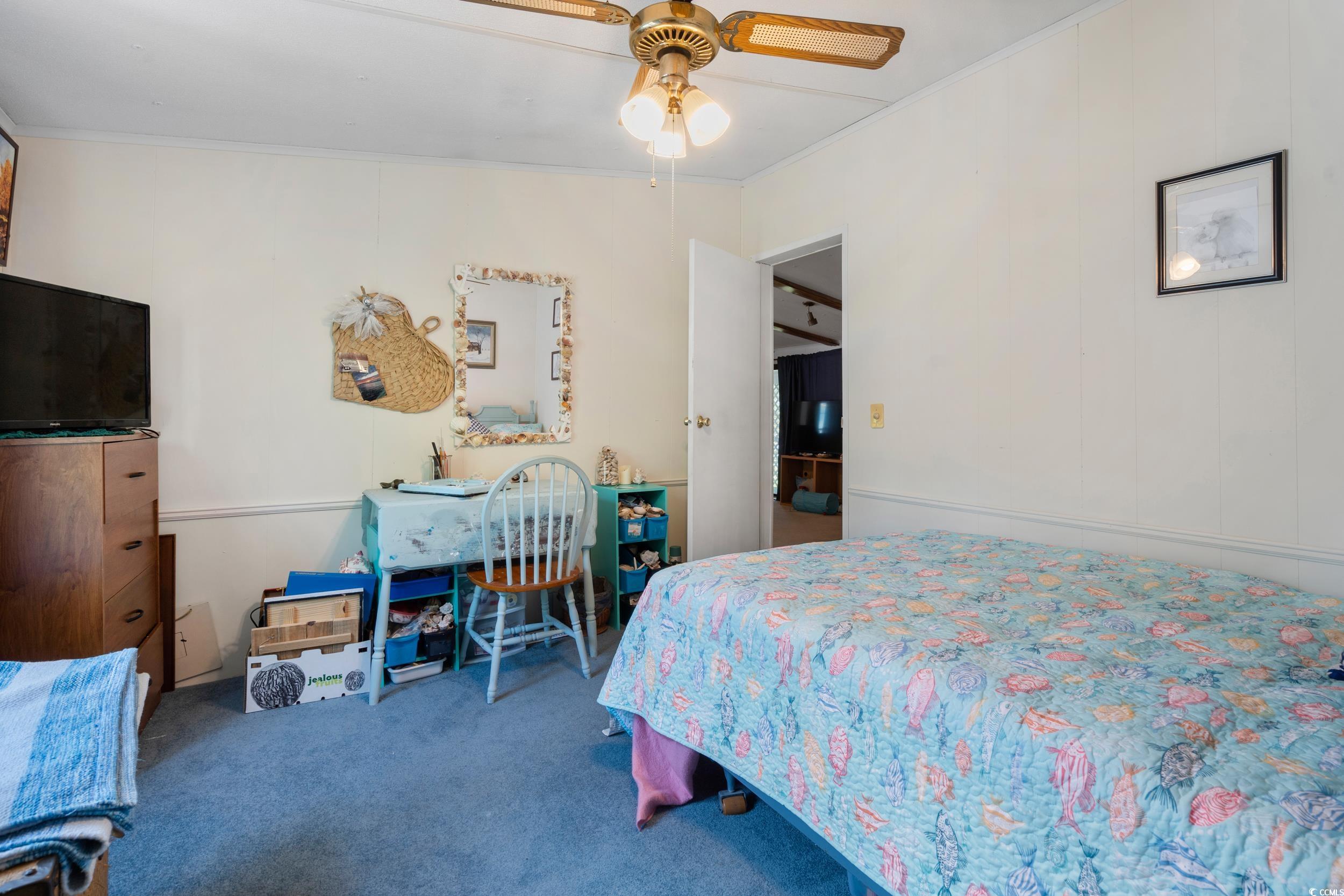 17 Crooked Island Circle Murrells Inlet, SC 29576 - Photo 25 of 39 Bedroom with carpet floors, ornamental molding, and ceiling fan