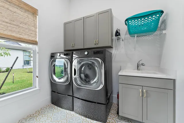 a view of a hallway with wooden floor and a hallway