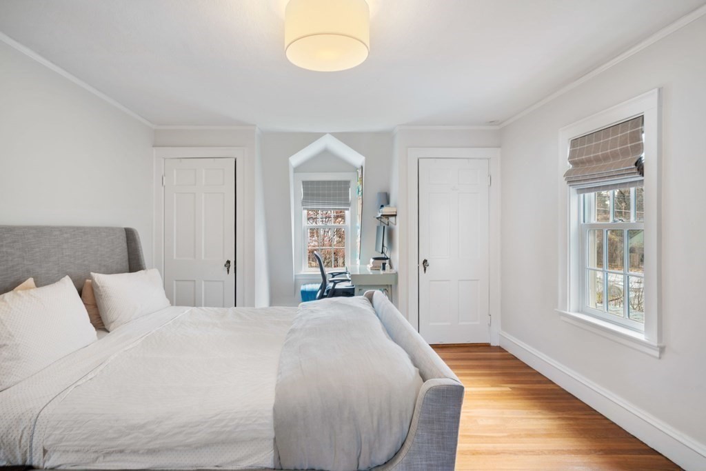 47 Beverly Road Newton, MA 02461 - Photo 12 of 19 a spacious bedroom with a bed and a window