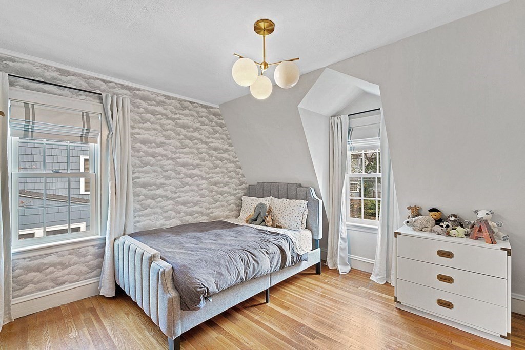 47 Beverly Road Newton, MA 02461 - Photo 13 of 19 a bedroom with a bed wooden floor and window