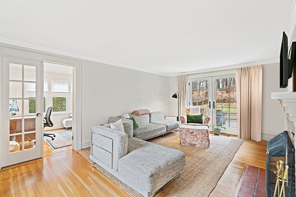 47 Beverly Road Newton, MA 02461 - Photo 7 of 19 a living room with furniture and a flat screen tv