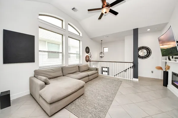 a living room with furniture and a window