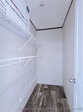 a view of a room with racks on the wall